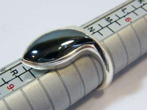 Sterling silver ring with hematite - weighs 7.5g - size o