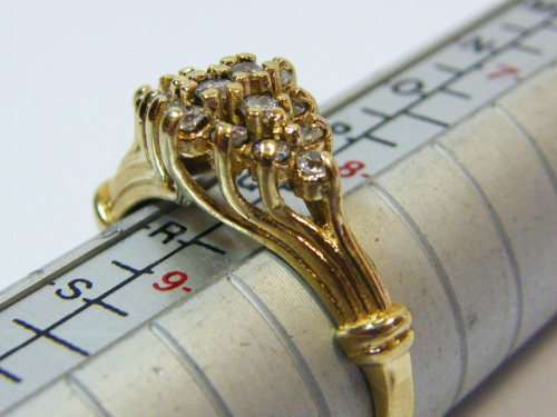 9kt Gold ring with cubic zirconias - weighs 2.9 grams - size  Q+