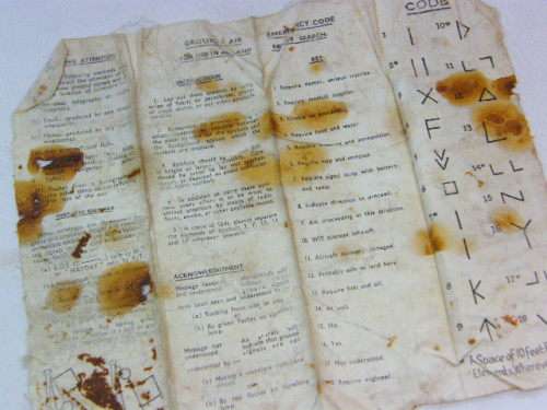 WW2 period Air/Land emergency rescue code instructions printed on cloth - used by Air Force pilots
