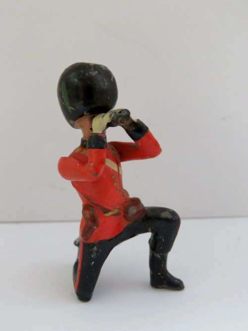 Vintage British Guardsman with binoculars lead soldier