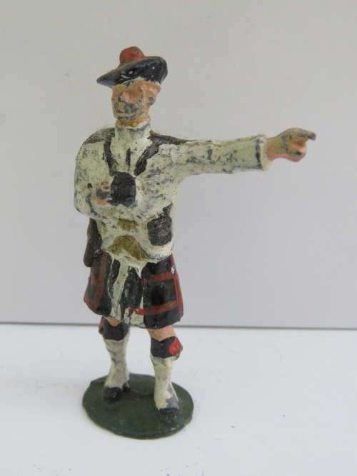 Vintage Scottish lead soldier with binoculars