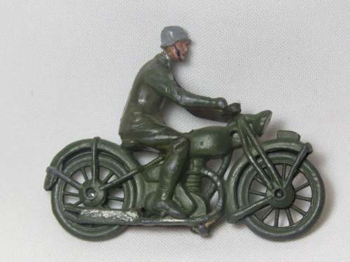 Vintage lead soldier with motorcycle