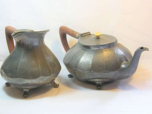 Teapot & milk jug inscribed 'civic pewter' on milk jug