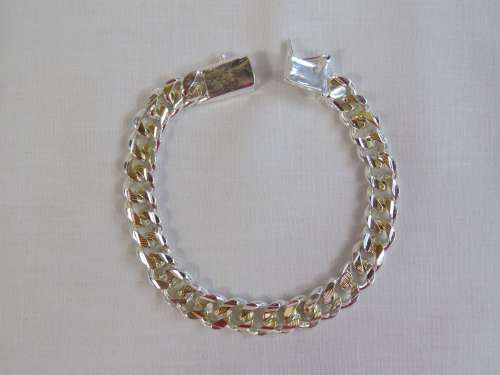 Sterilng silver with gold tone bracelet - Marked 925 - Weighs 31.2 grams