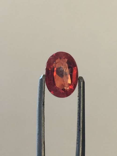 Dark orange Sapphire oval with inclusions - 1.92ct