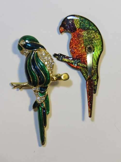 Pair of vintage Parrot brooches