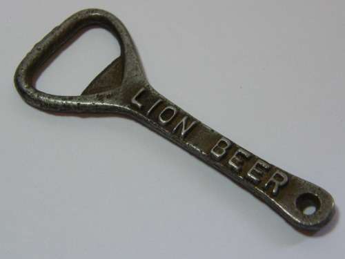 Vintage Lion beer advertising bottle opener