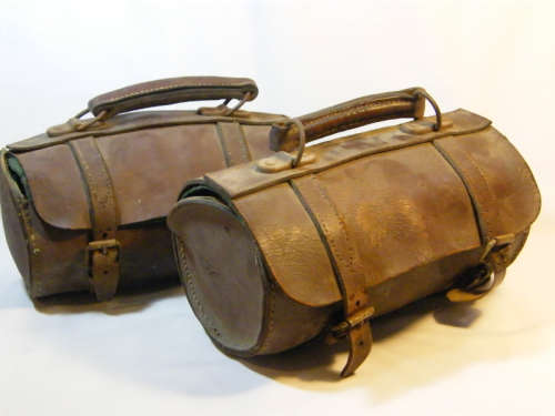 Set of 4 vintage bowling balls in 2 leather bags