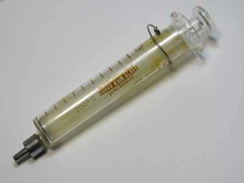 Vintage Super Eva glass syringe