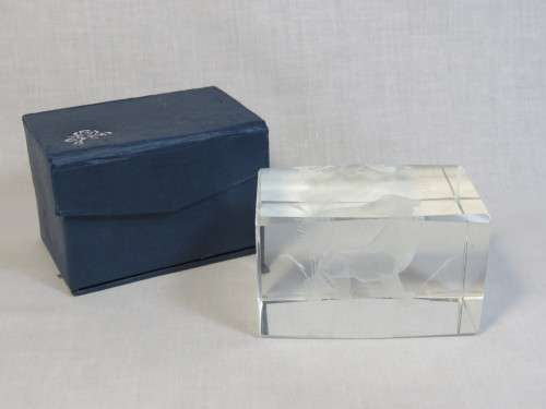 Glass paperweight with lion inside