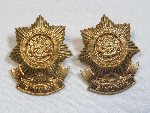 Pair of Kangware Police collar badges
