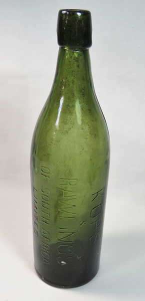 Antique kops and rawlings green beer bottle