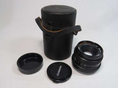 Chinon 50mm lens f=1:1.9 - Lens is clean - in Sankor case