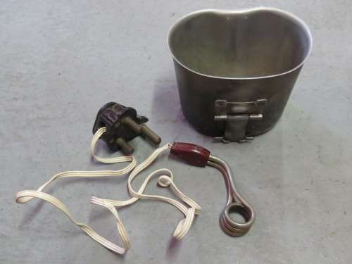 Old military fire bucket with water heating element