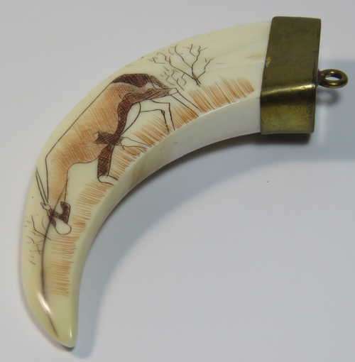 Vintage Warthog tooth key chain pendant with scrimshaw of Oryx