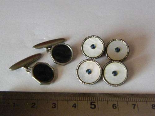 2 Pairs of silver cufflinks, hallmarks are not visible - as per scan