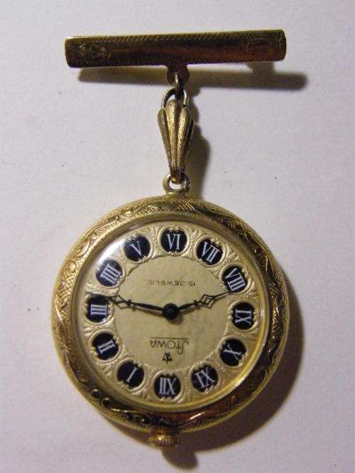 Stowa Gold plated nurses watch with 9kt gold brooch, working and in nice condition