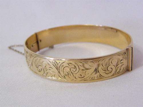 9kt Gold Bronze Core Bangle with safety chain - weighs 34.4 gram - as per photo