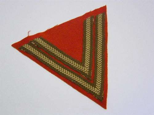 South Africa school cadets Corporal Rank Badge on red background - as per photo
