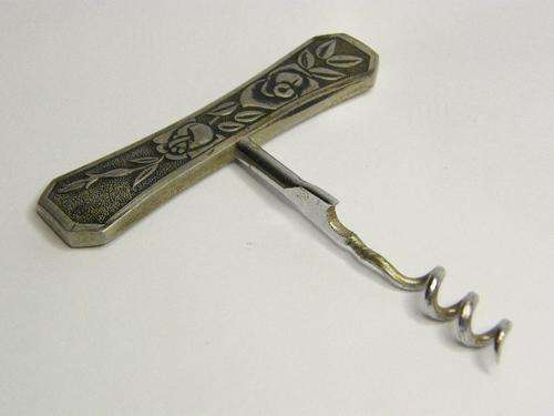 Vintage stainless steel direct pull corkscrew with bow tie handle & flower pattern - as per photo