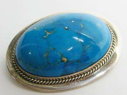 Vintage sterling silver brooch with blue stone - as per photo