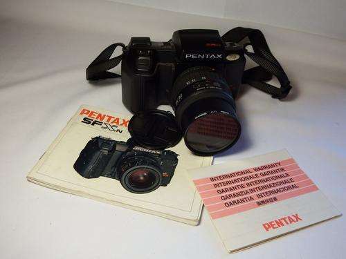 Pentax SFX 35 mm camera with Pentax - F zoom lens - not sure if working