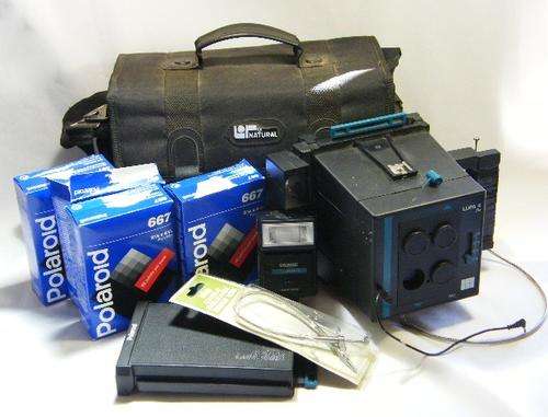 Vintage Polaroid Lupa 4 Pro ID photo camera with 4 packs of films - not sure if working -as per scan