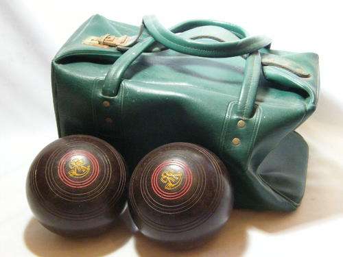 Pair of vintage henselite lawn bowls bowling balls in bag - as per photo