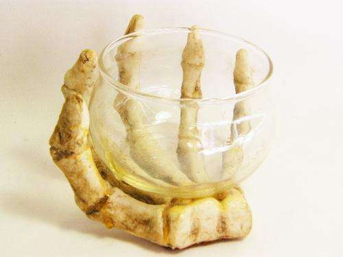 Vintage glass bowl with skeleton hand - as per photo