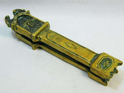 Vintage brass nutcracker - shaped like grand father clock - as per photo
