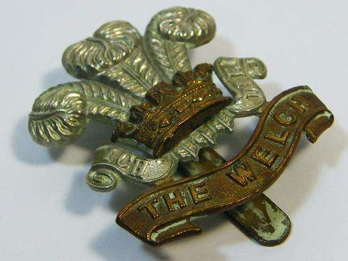 The Welch regiment cap badge with slide - as per photo