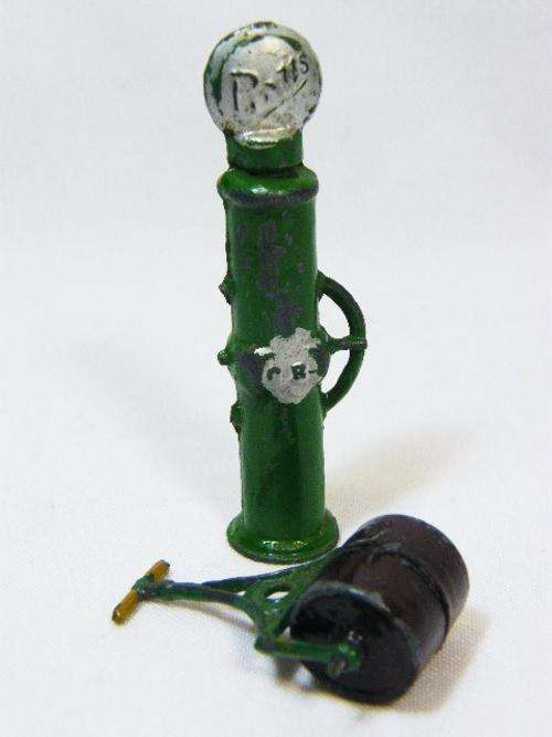 Lead / metal figure vintage heavy roller & gas pump - as per photo