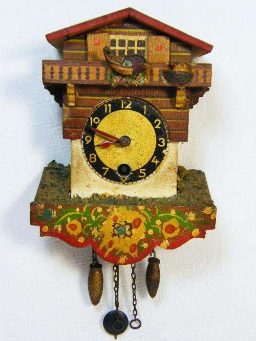Vintage miniature animation windup wall clock - working - as per photo