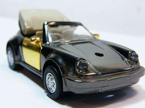 Vintage Porsche model car electric Piezo table lighter with glowing headlights - as per photo