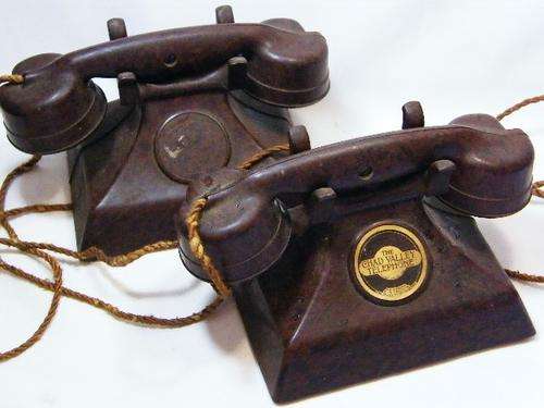 Pair of 1930's Chad Valley bakelite toy telephones - as per photo