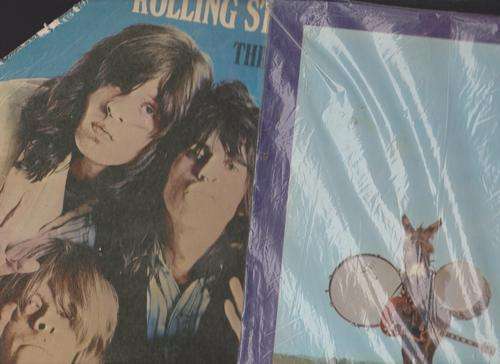 Four rolling stones lps