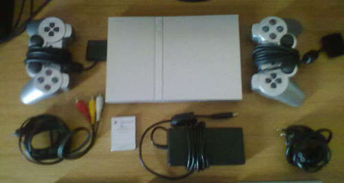 Sony Playstation 2 console plus games