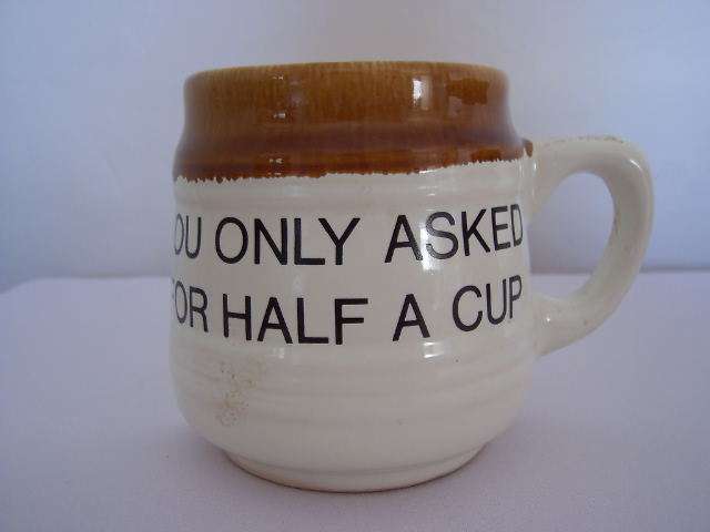 HAND CRAFTED MAJOLICA POTTERY - HALF-A-CUP. POSTAGE R35!!!