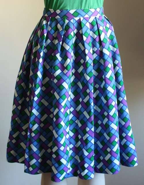 Bright 1960s full, fitted flared skirt
