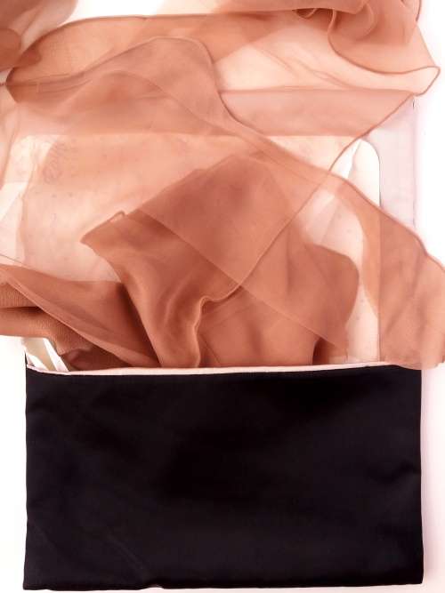 1950s rayon stockings in black satin evening bag