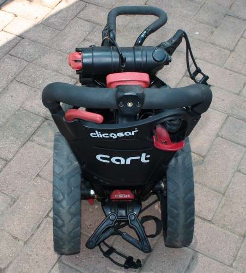 LOVELY CLICGEAR GOLF CART IN EXCELLENT CONDITION, FOLDABLE. SEE DESCRIPTION