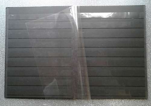 VERY NICE NEAT AND CLEAN 8/16 PAGE STOCKBOOK. CLEAR INTERLEAVES.