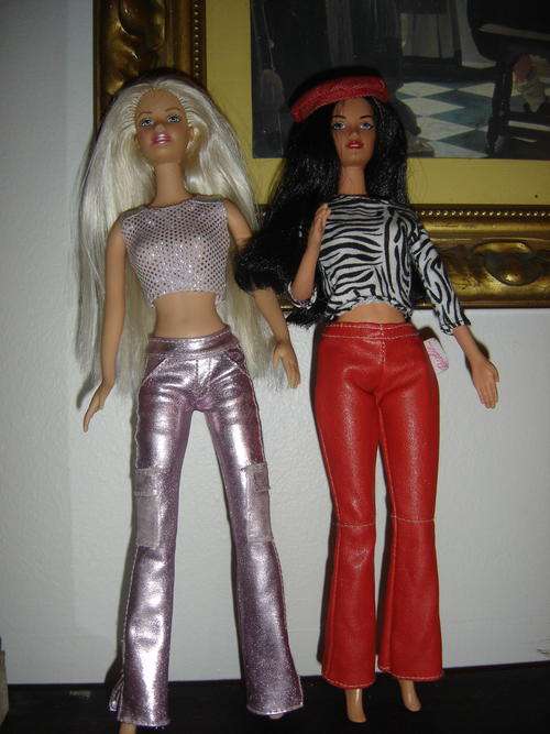 2 BENDABLE BARBIES