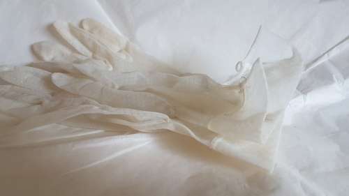 Vintage sheer white nylon wrist length ladies dress gloves