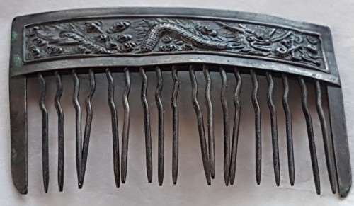 Antique Chinese silver hair comb with a dragon scene
