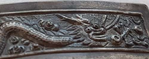 Antique Chinese silver hair comb with a dragon scene