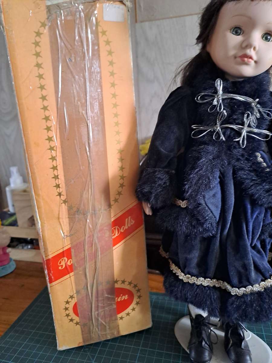 Vintage Porcelain doll 40cm tall with stand, please read description