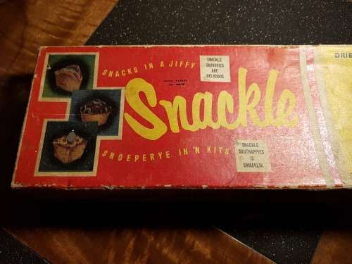 Vintage Snackle in its original box with instructions