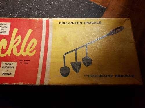 Vintage Snackle in its original box with instructions