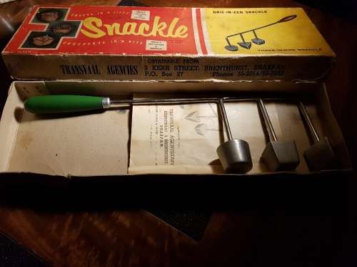 Vintage Snackle in its original box with instructions